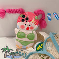 Pink and green cartoon girl swimsuit design on a silicone iPhone case for fall protection.