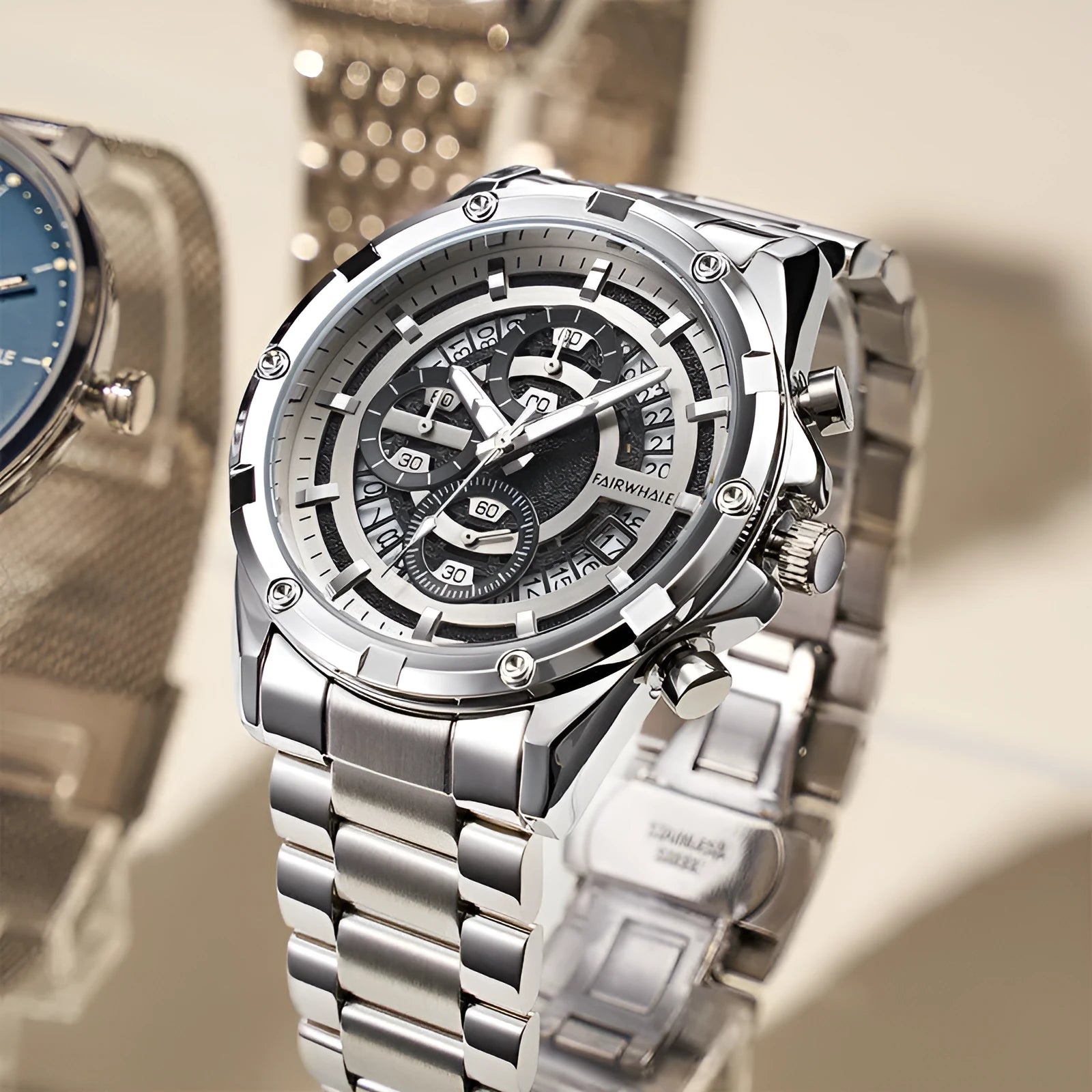 Men's waterproof quartz watch with luminous markers on stainless steel bracelet in three colour variations
