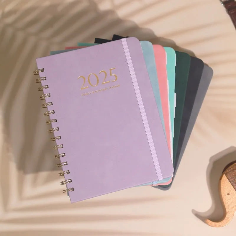 A5 leather notebook with metal coil binding in multiple colour options