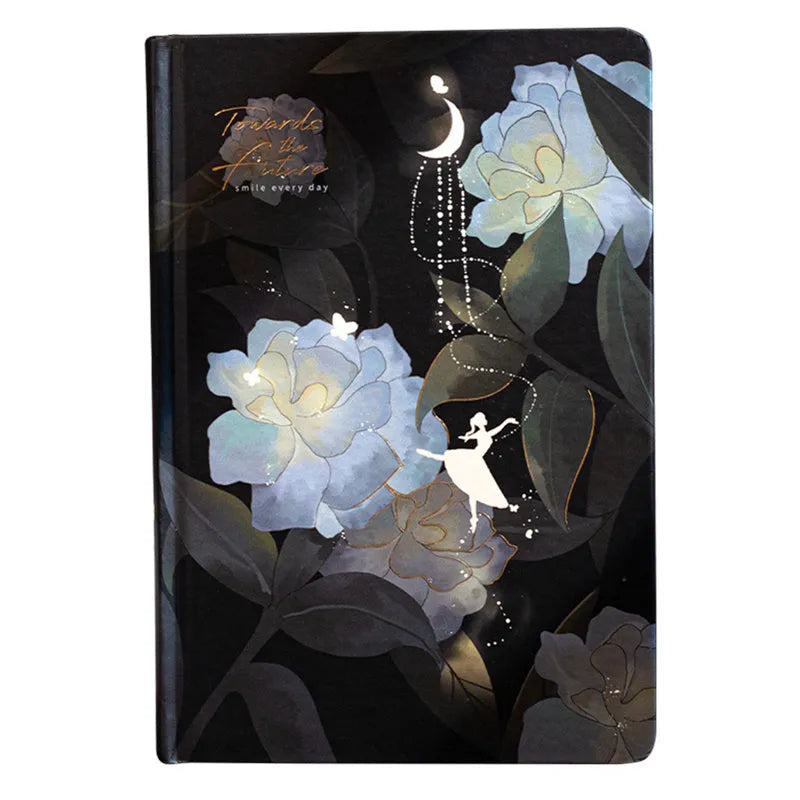 A5 size notebook with a luminous cover, open to show colour illustration pages and lined 160gsm paper.