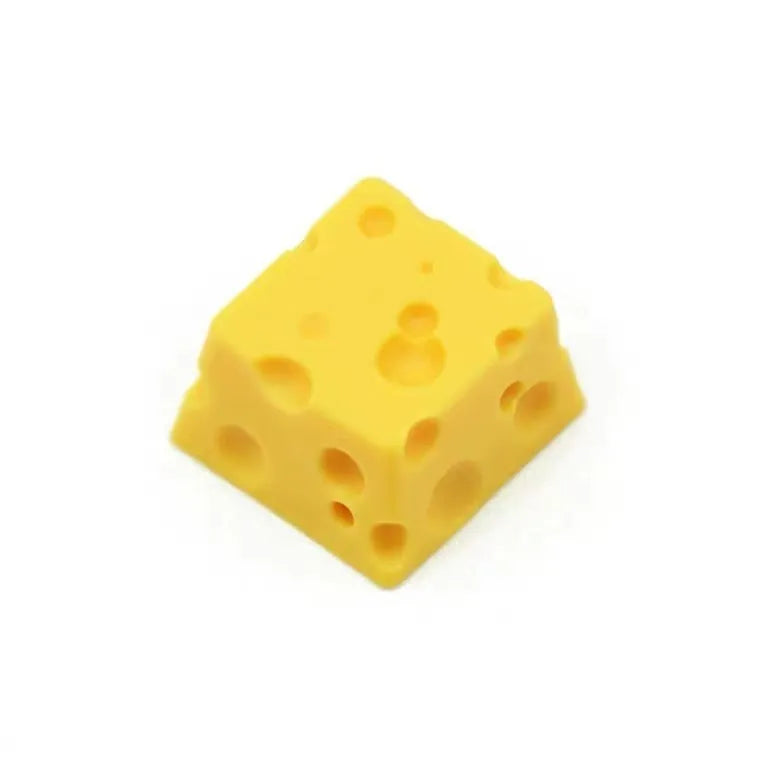 Yellow resin cheese wedge keycap for mechanical keyboards with MX stem mount.
