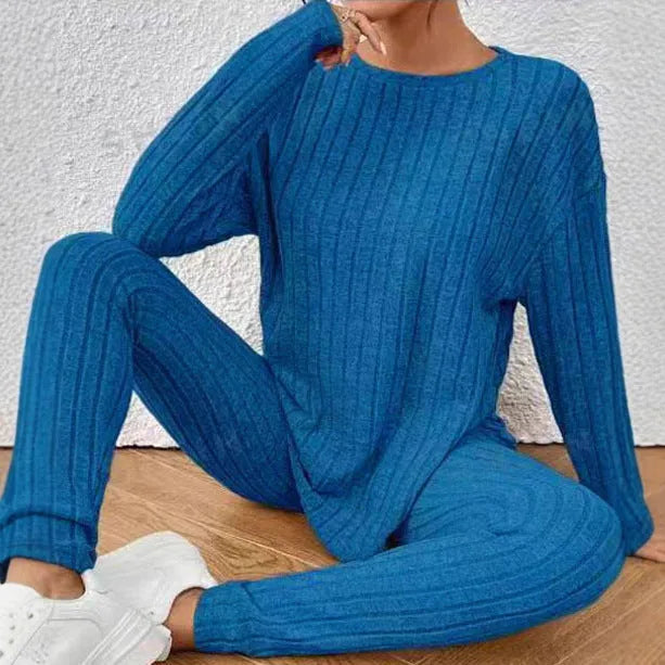 Women's black sunken stripe two-piece lounge set with regular sleeves and matching trousers