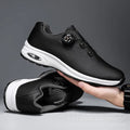 Low-top black and white mesh casual shoes with cross shoulder strap and round toe on a composite sole.