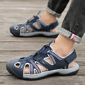 Men's blue and black casual sports shoes with mesh upper, rubber sole, and Velcro strap.