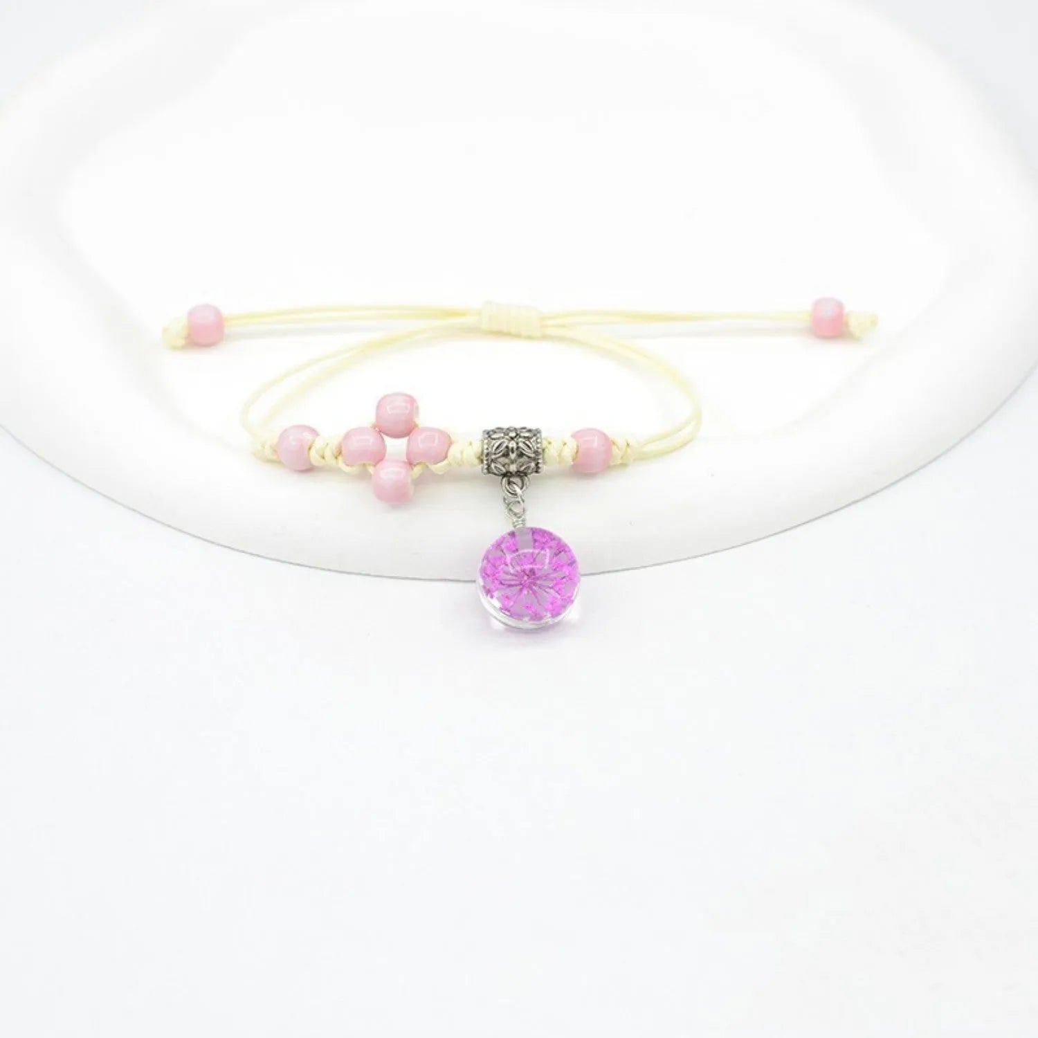 Glass dried flower bracelet with large 1.4cm beads containing real preserved flowers in various colours