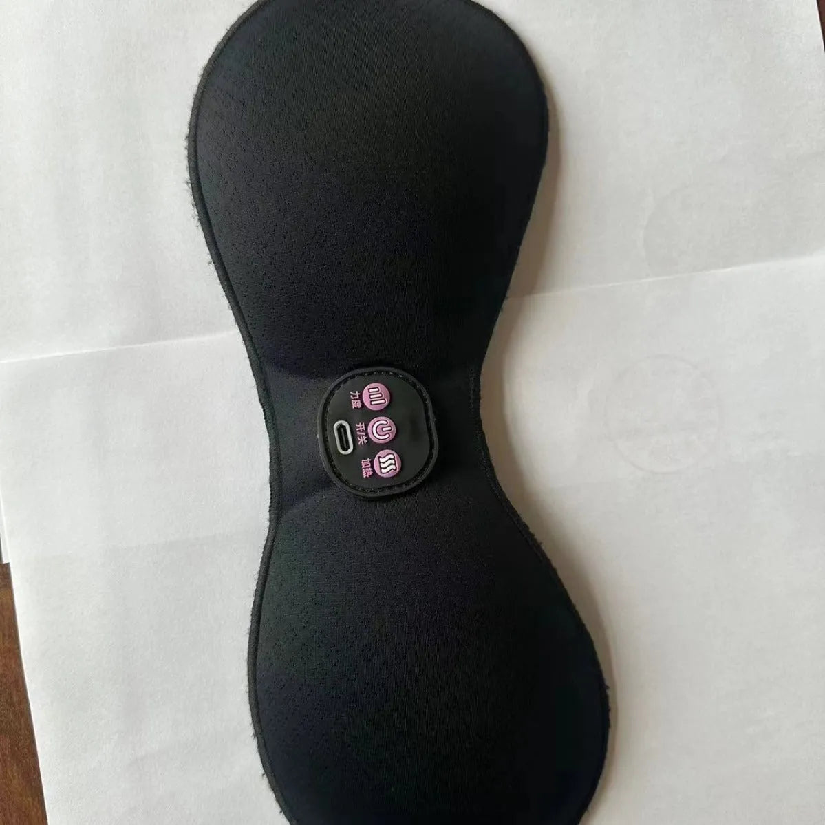 Black electric massage bra inner cushion with adhesive chest stickers and a 3-key control panel.