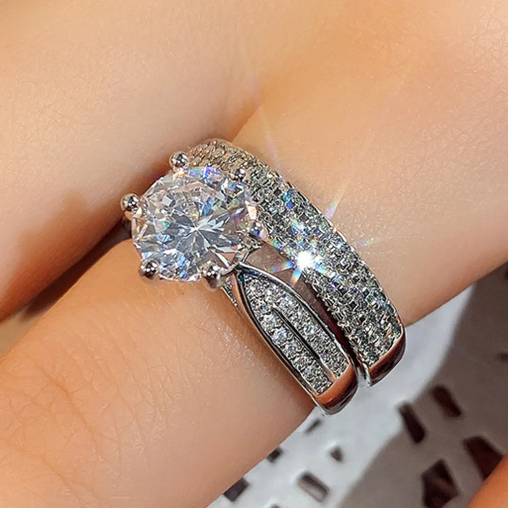 Geometric wedding ring bracelet in white gold colour showing round decorative elements