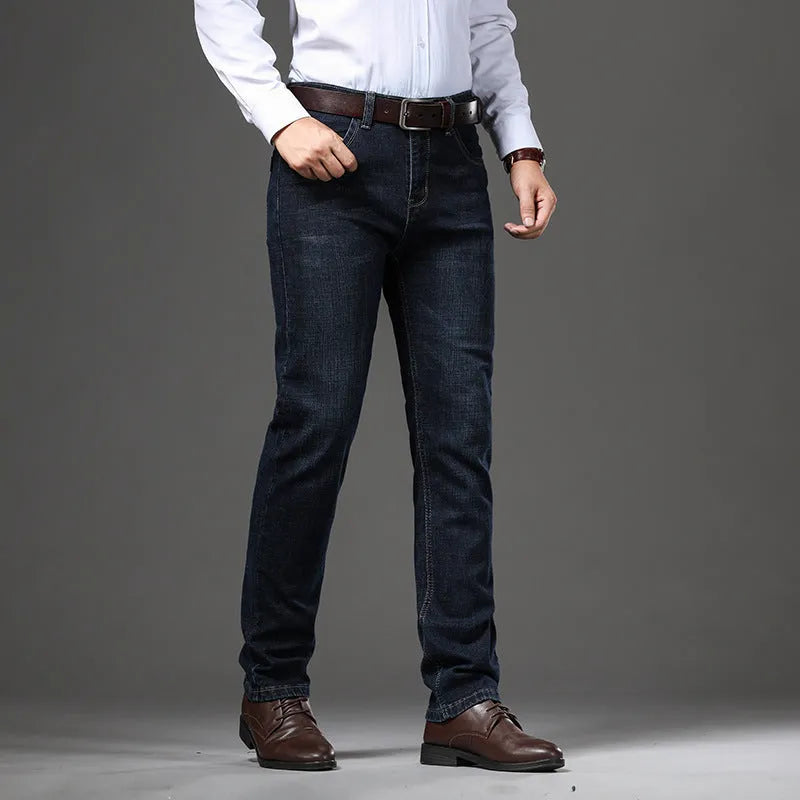 Men's black and blue stretch denim jeans showing straight-leg business casual style with mid waist and zip fly
