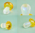 Geometric crystal mushroom decoration in transparent, green, red, or yellow measuring 40mm by 53mm