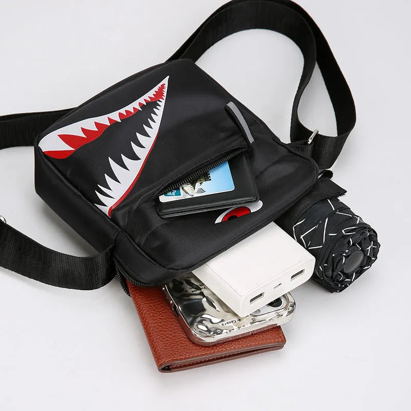 Men's small Oxford cloth crossbody bag with animal print pattern in black colour