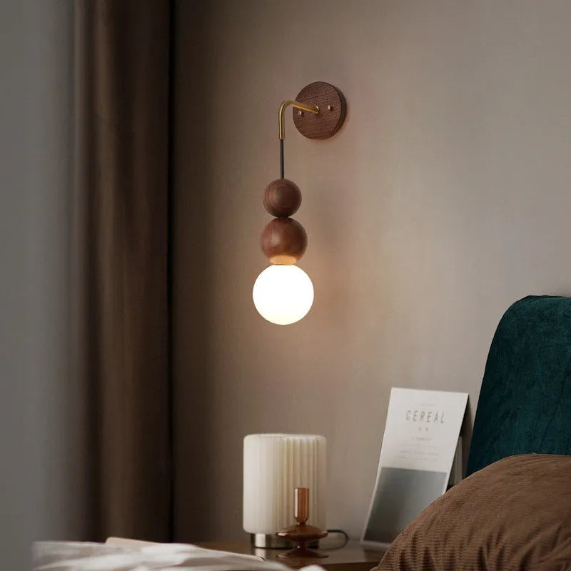 Wood and copper wall lamp with suspension wire and tri-colour light, 10cm diameter