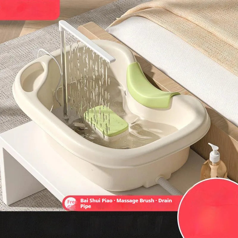 Bed shampoo basin with circulating water pump, drain pipe, neck pillow and massage brush for lying-down hair washing