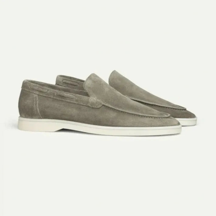 Men's matte suede flat shoes in sky blue with rubber sole and round toe, shown on plain background