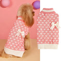 Red dog sweater with a large white love heart design on the side.