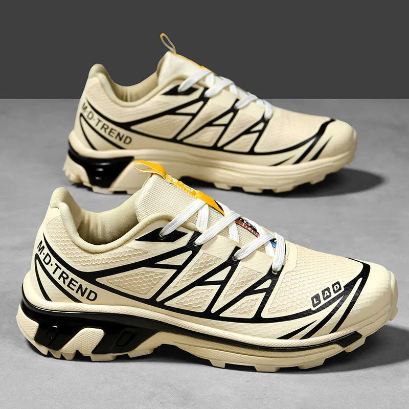 Low top hiking shoes in khaki with round toe, artificial leather upper, and flat rubber sole.