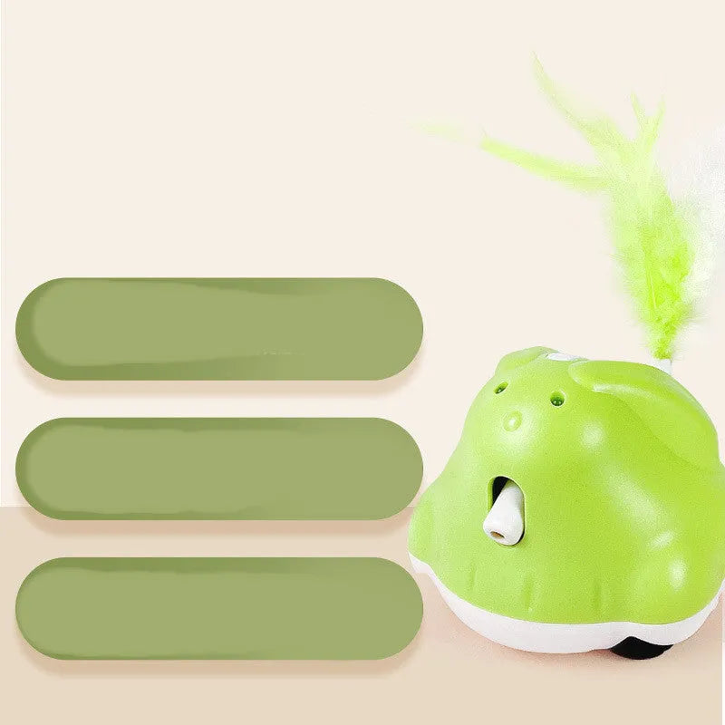 Green USB rechargeable electric cat teaser with rabbit design, infrared laser, and feather attachments on a floor