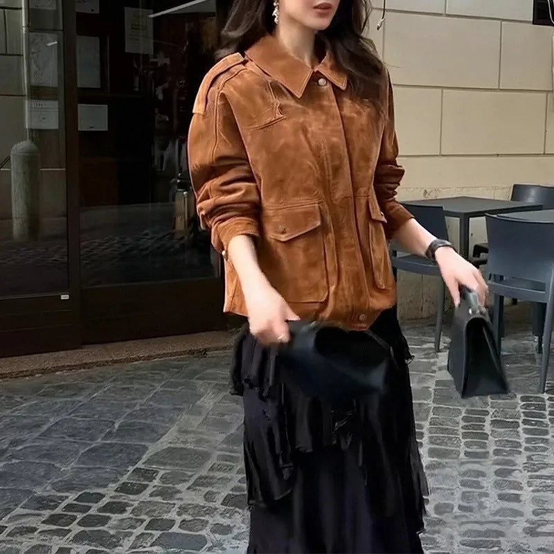 Women's bright brown suede-style street chic coat with regular sleeves on a hanger