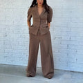 Brown slim fit polyester suit set with long sleeves showing top and trousers