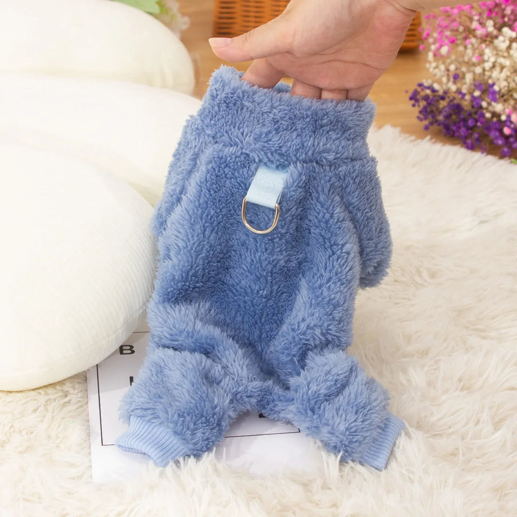 Khaki four-legged dog jumper with high collar and a towing ring on the back, made of thick plush fabric.