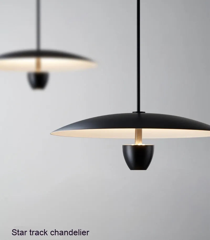 Modern minimalist black chandelier with 400mm diameter emitting warm light for dining room or bedroom