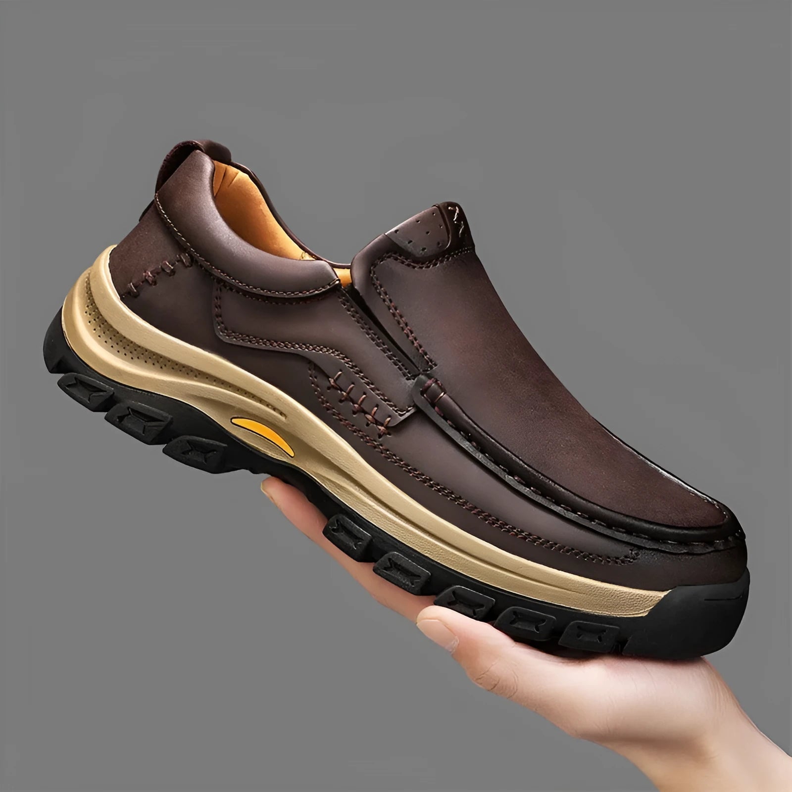Men's black thick-soled outdoor mountaineering shoes with round toe and rubber sole.