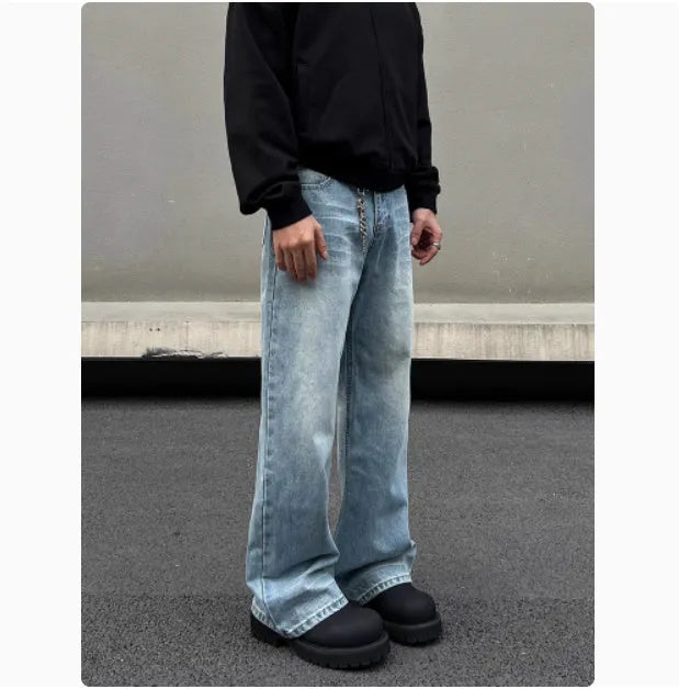 Men's blue straight jeans with whisker wash details and flared leg style