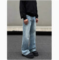 Men's blue straight jeans with whisker wash details and flared leg style
