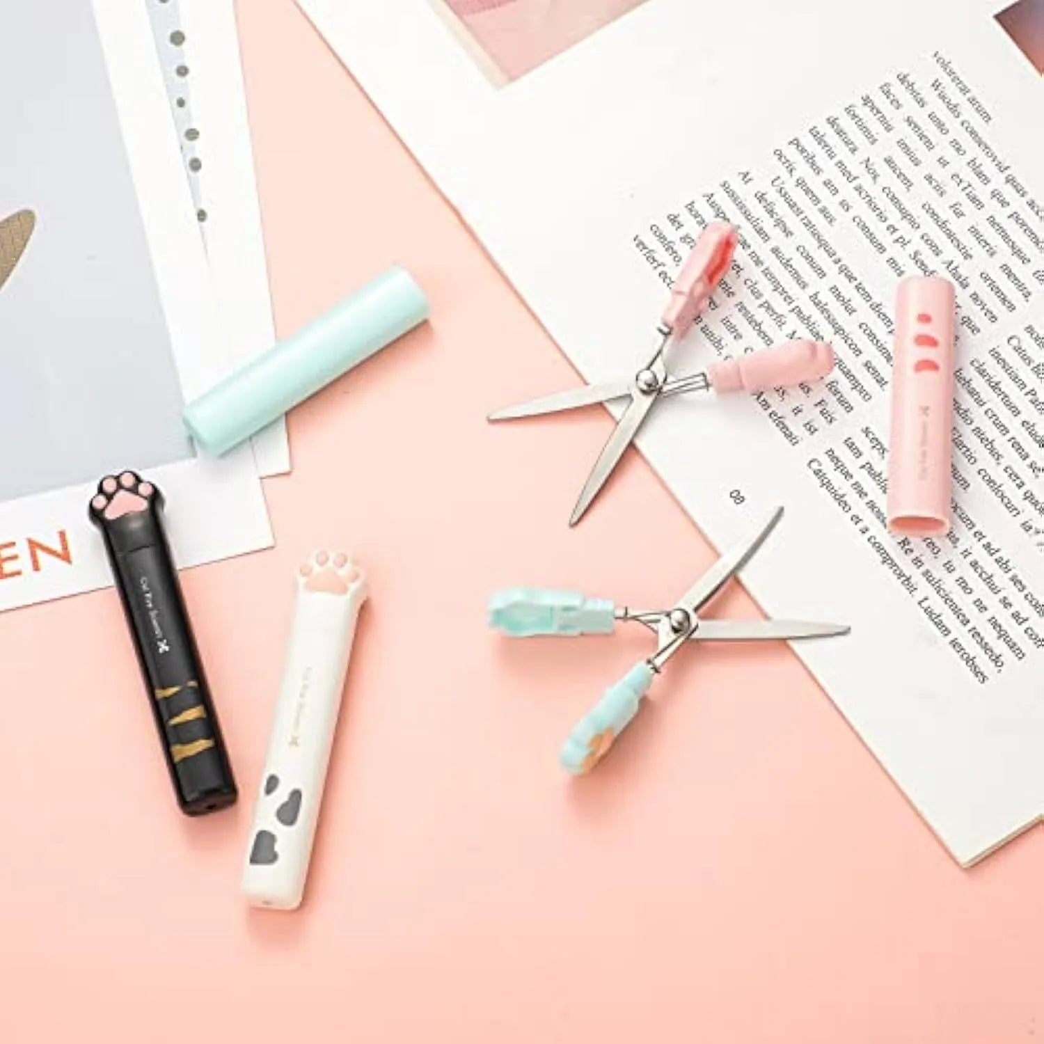 Cat paw mini folding scissors in pink, white, black, and blue colours showing closed and open positions