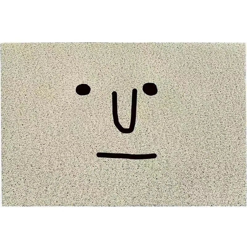 Cartoon Mr Big Nose character design on a square PVC floor mat in geometric colours.