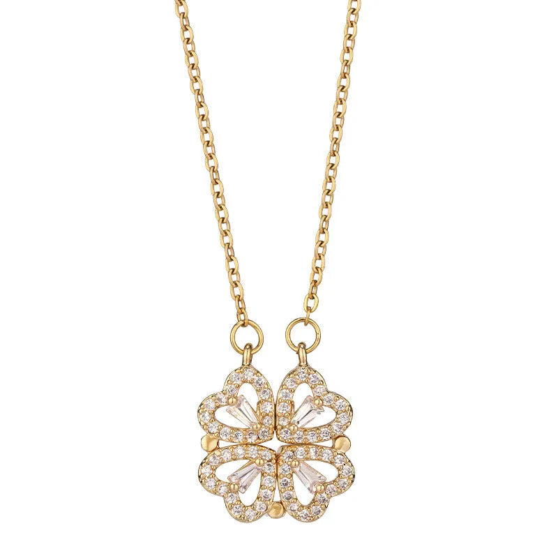 Four-leaf clover titanium steel necklace with diamond inlay pendant, gold finish, 42+6cm chain on light background