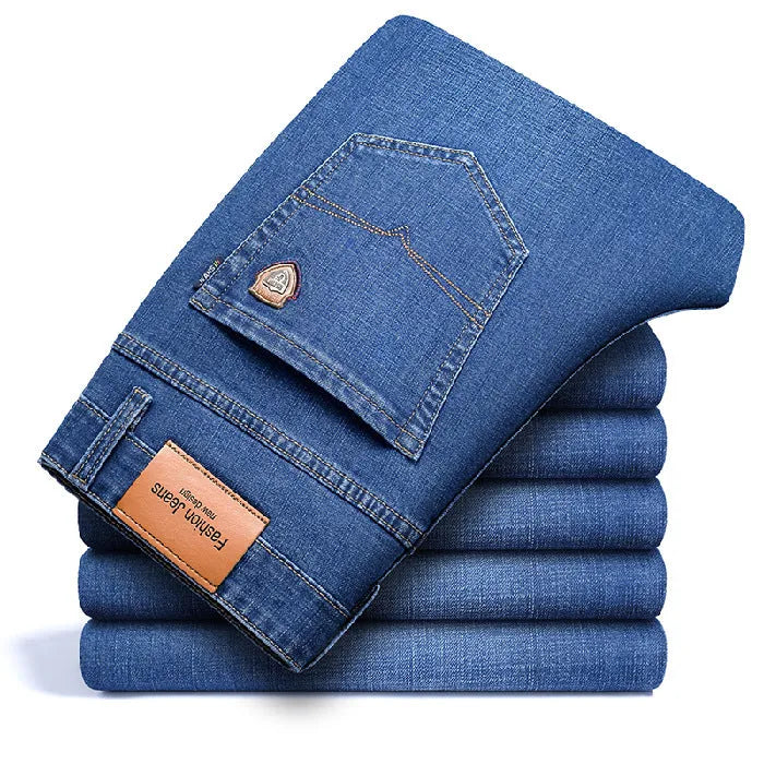 Men's straight loose elastic denim business trousers in dark blue colour, mid-waist straight-leg style on white background