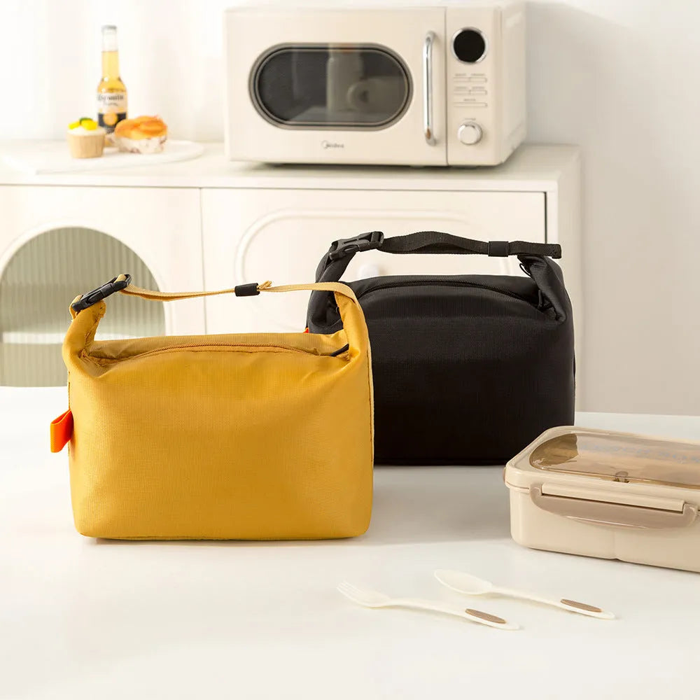 Japanese style insulated lunch bag in Oxford cloth, shown with Army Green, Black, Gray, and Yellow colour options.
