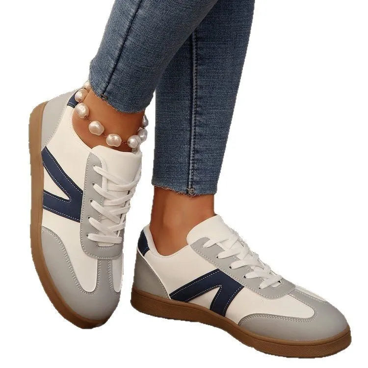 Blue women's low-top lace-up training shoes with artificial PU upper and rubber sole for hiking.