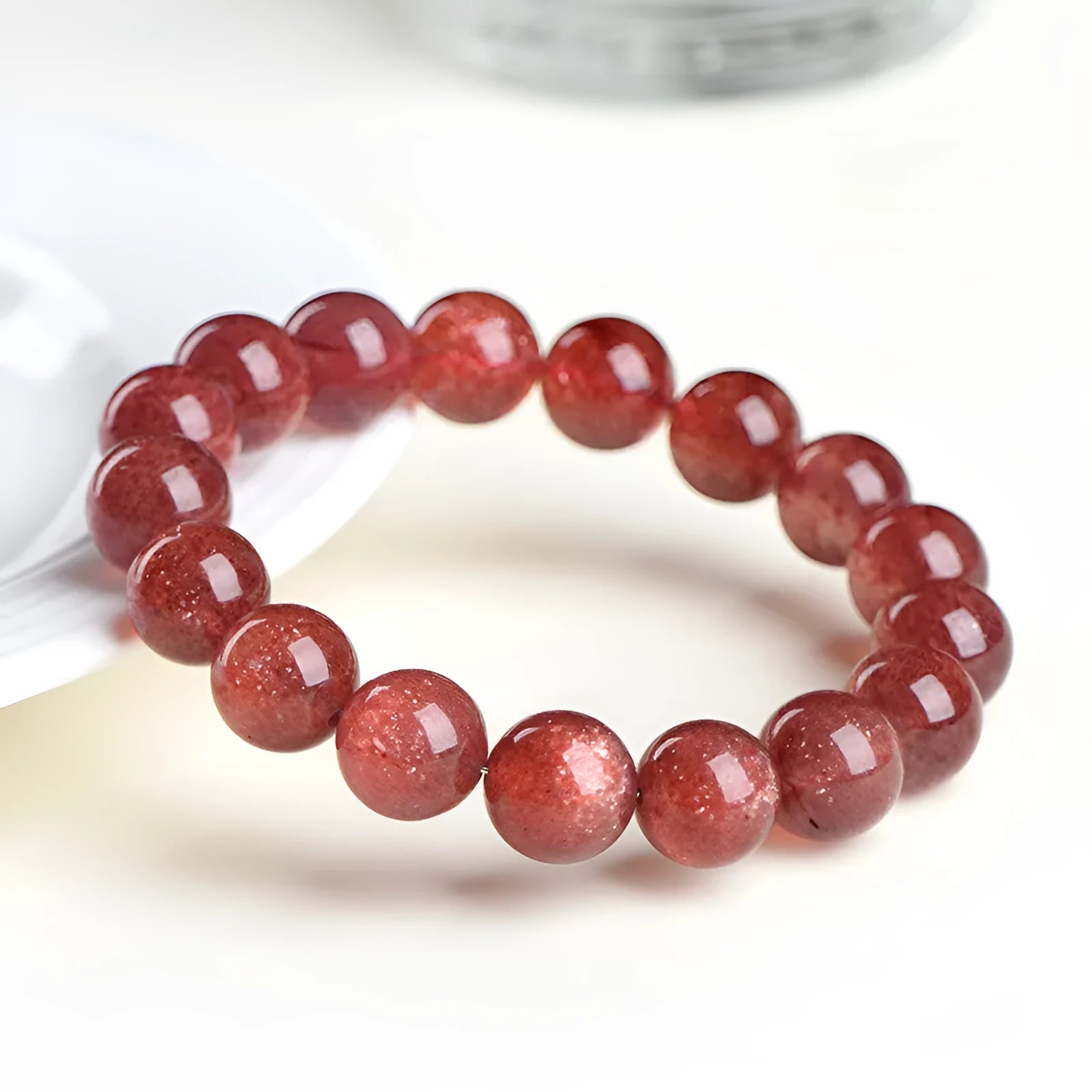 Natural starlight cherry red strawberry quartz bracelet with geometric crystal beads in multiple diameter options
