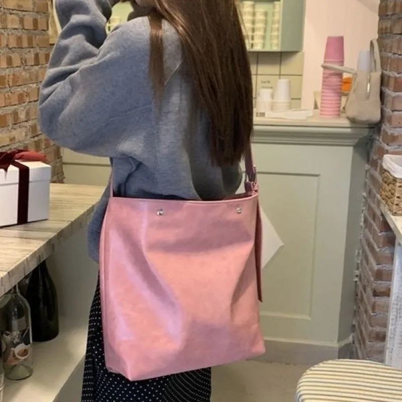 Corduroy one-shoulder bag in pink or brown showing dimensions and PU lining interior