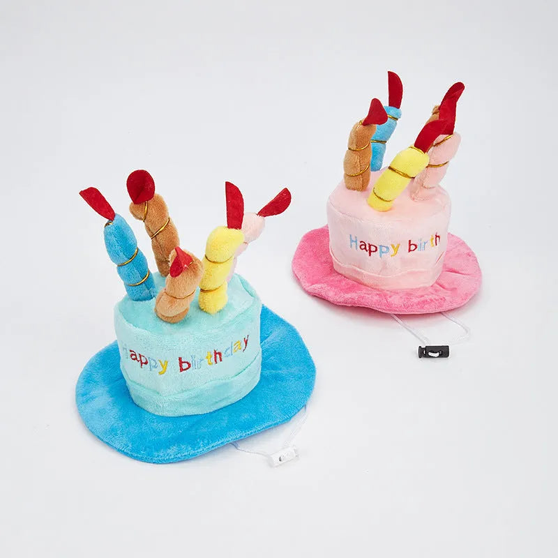 Blue or pink dog birthday hat with elastic chin strap measuring 21x15x6.5cm