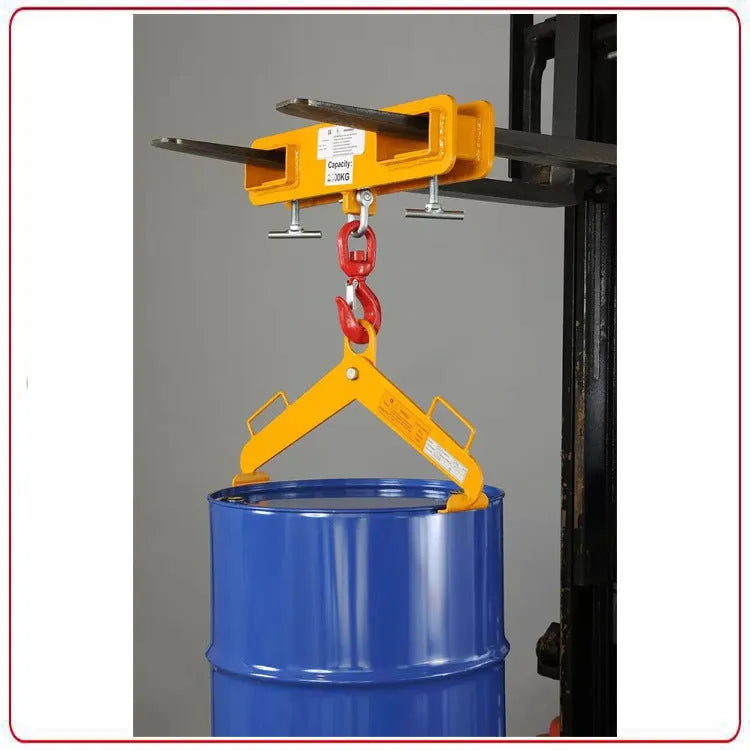 MK forklift crane hook attachment with rotatable drum and safety lock mounted on forklift forks.