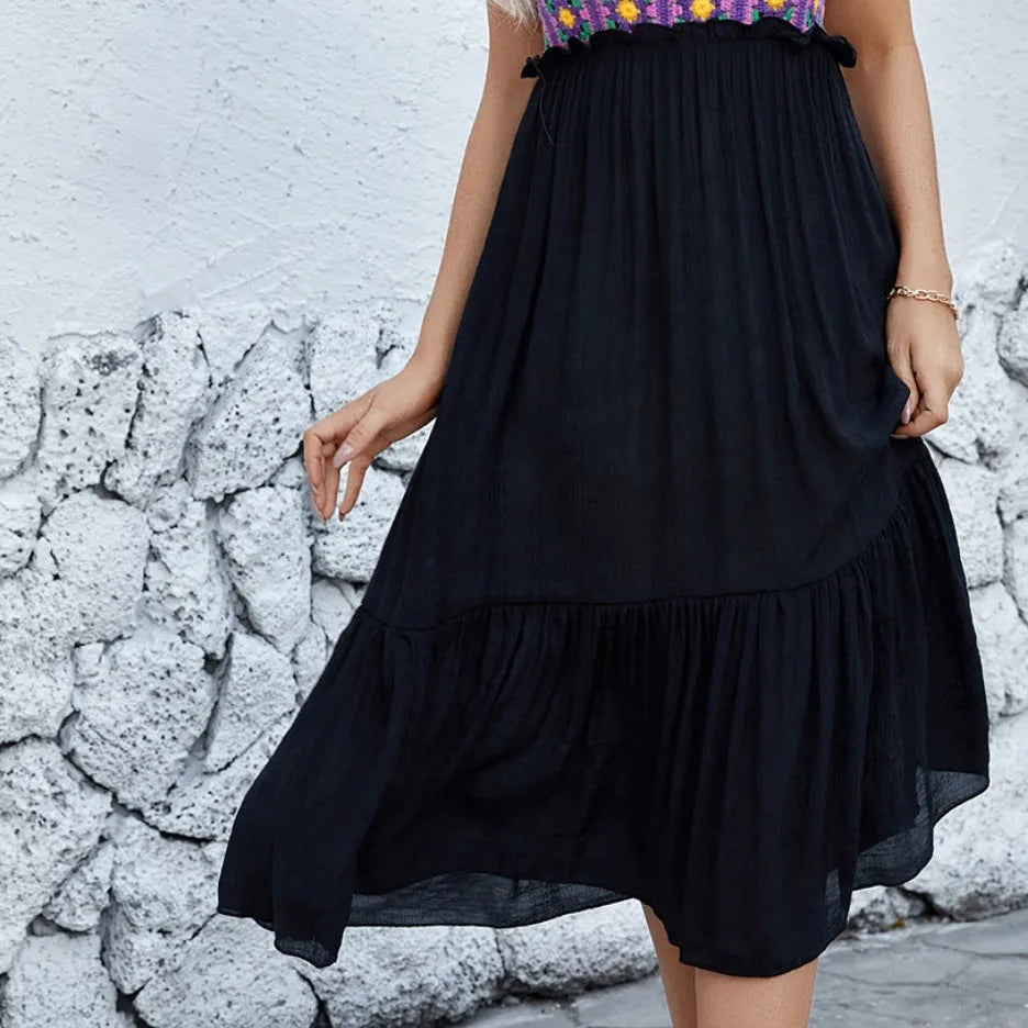 Purple sleeveless dress with white hand-hooked floral stitching pattern on the front