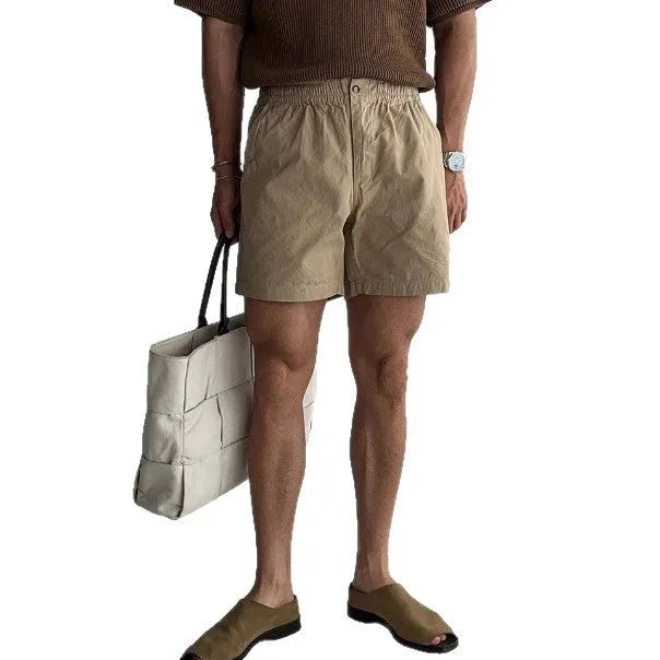 Cotton loose fit sports shorts in black, white, and khaki colours for summer wear