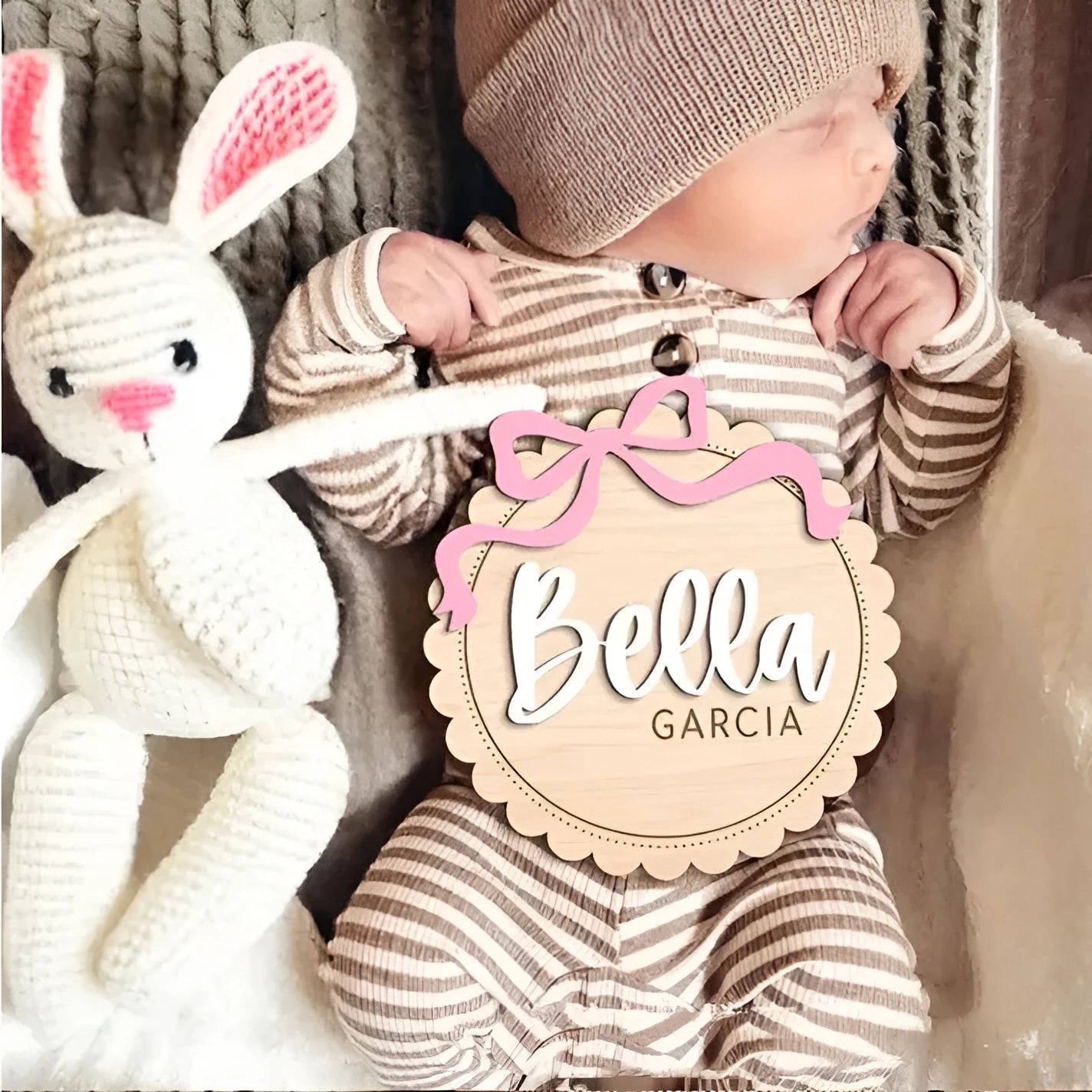 Square wooden baby room ornament personalised with a name, shown in 13cm and 15cm sizes.