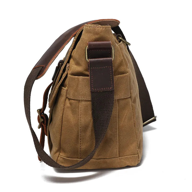 Water-repellent waxed camera shoulder bag in canvas and first layer cowhide leather with curved shoulder strap
