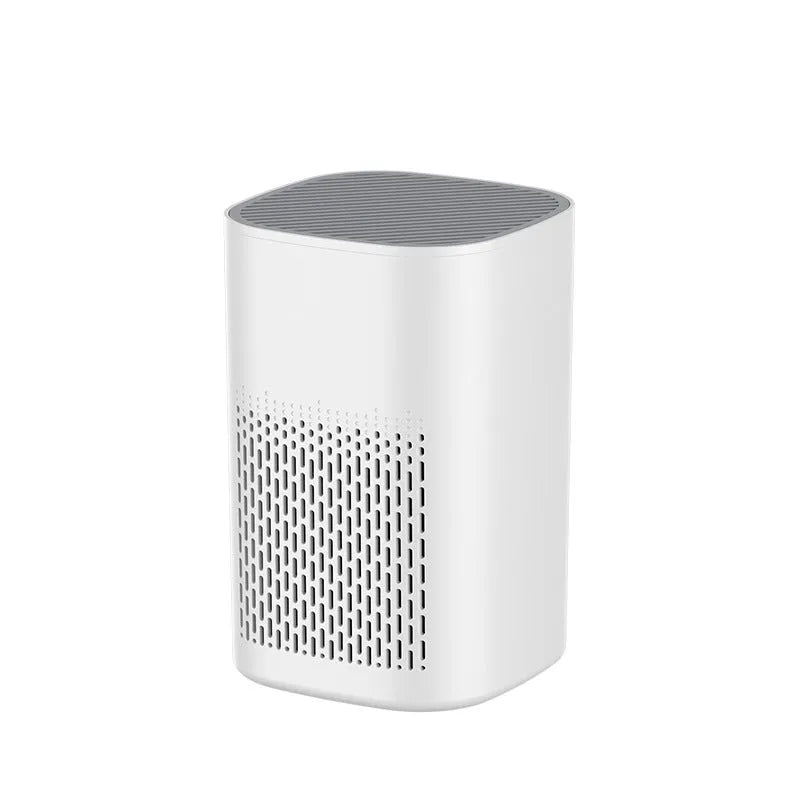 Simple style desktop air purifier with USB power port on a wooden desk.