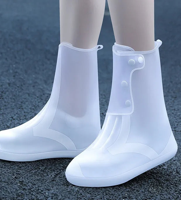White PVC women's waterproof shoe covers high top design with reusable construction for rain protection