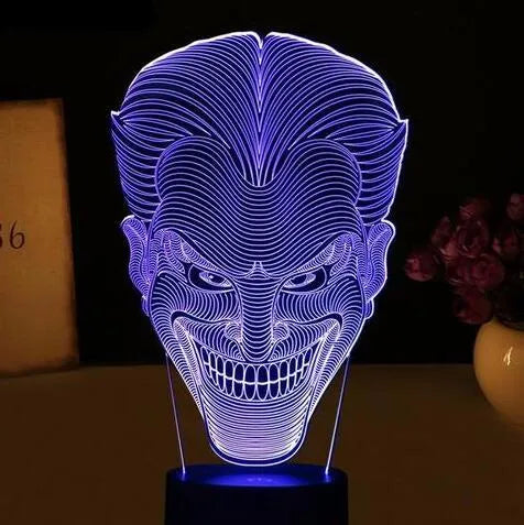 3D LED table lamp with acrylic base showing colourful gradient lighting, remote control, and USB cable
