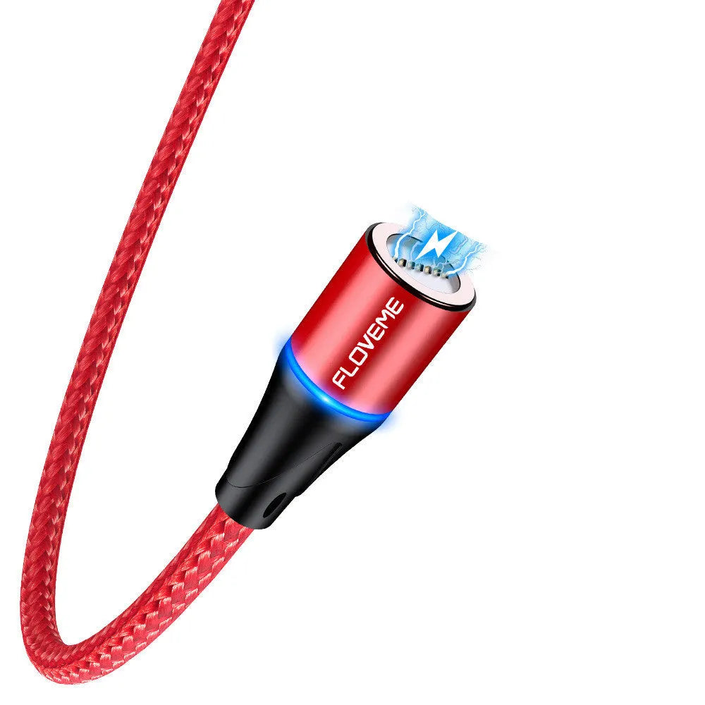 Black magnetic data cable with LED light on connector next to smartphone