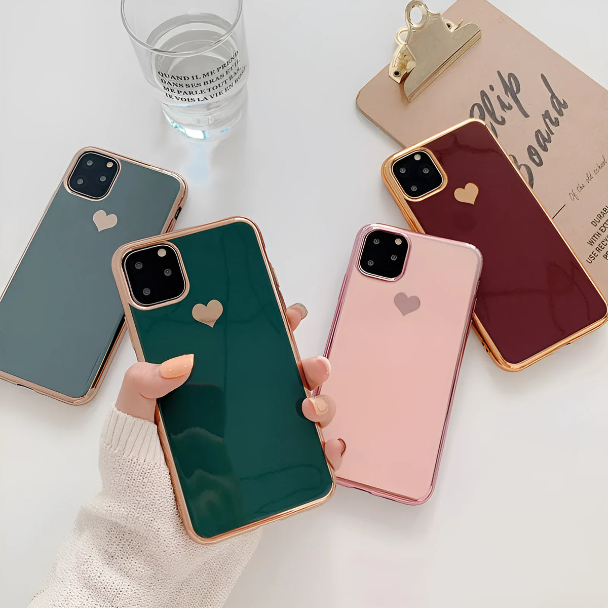 Solid colour TPU back cover phone case for iPhone models on a plain background