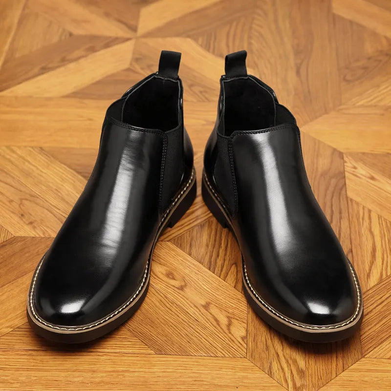 Men's black formal leather ankle boots with a pointed toe and square rubber sole.
