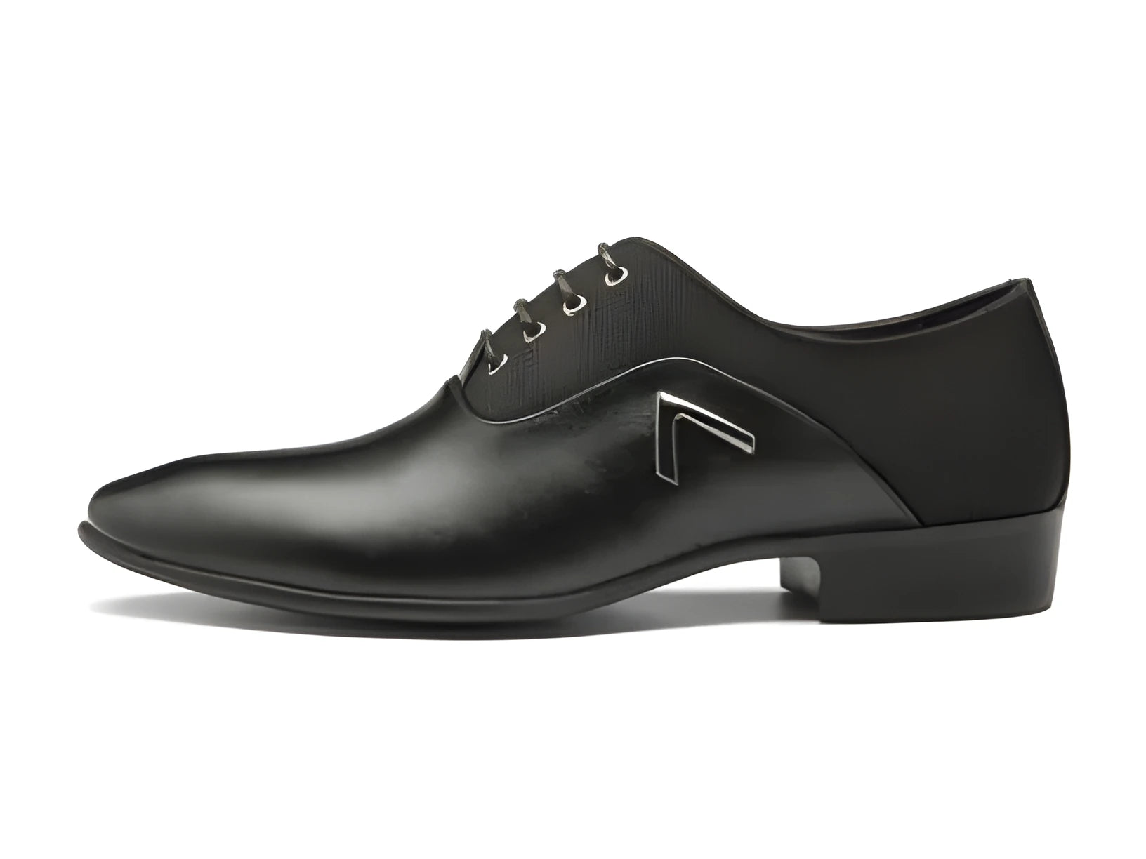 Men's black Oxford shoe with rubber sole and low upper height on a white background