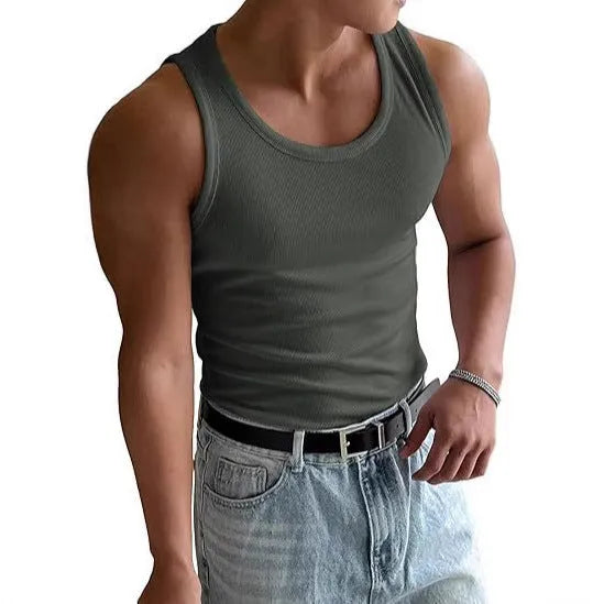 Men's tight fit polyester workout T-shirt with wool lining in various colours on a hanger.