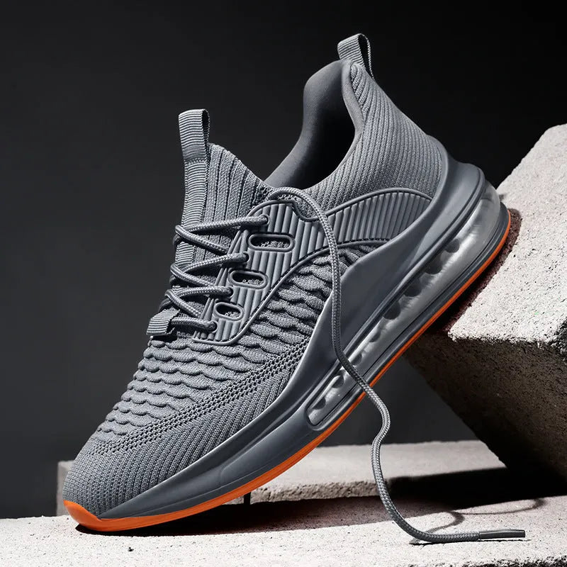 Men's black mesh running shoes with rubber sole and lace-up closure displayed on white background